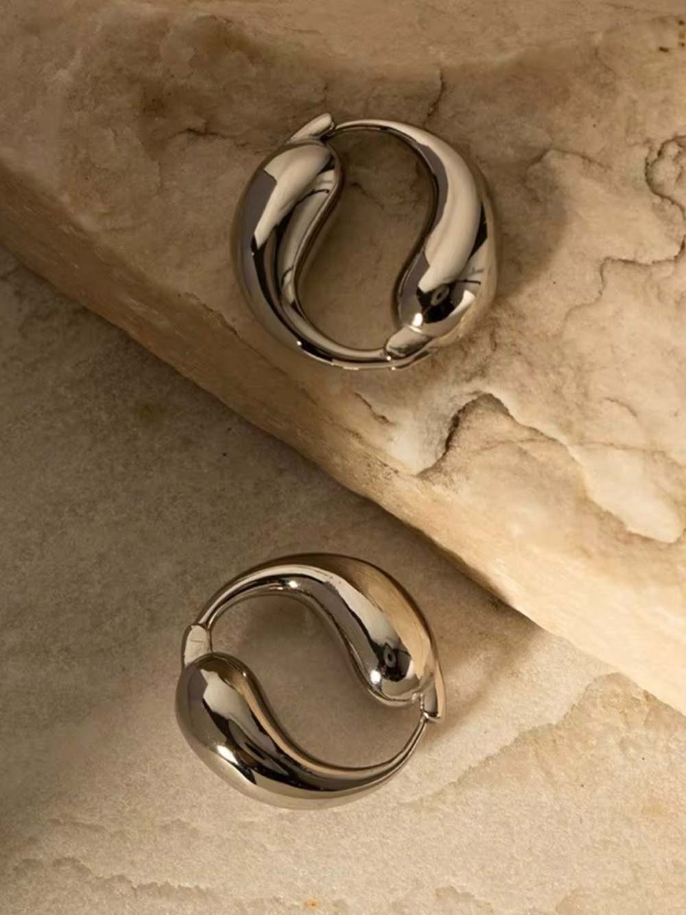 Polished Silver-Tone Hoop Earrings - Sculptural Wave Design